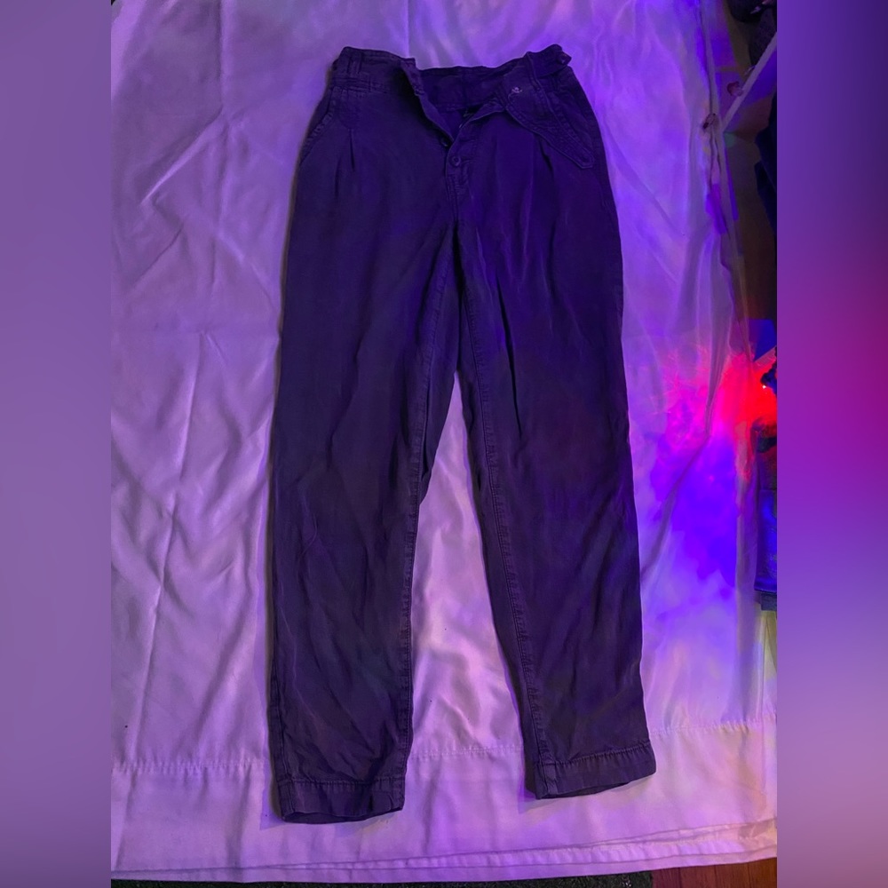 American eagle trousers that are a darkish grey with multiple buttons